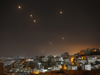 Many rockets, fired from Iran, are seen over Jerusalem from Hebron, West Bank on October 0