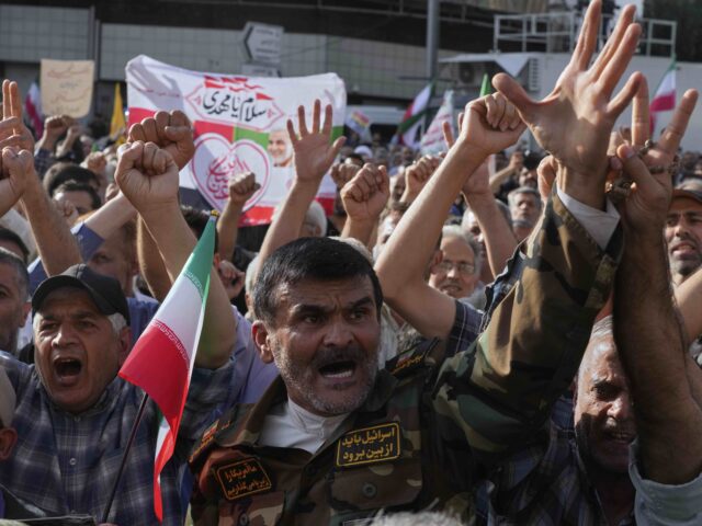 Iran protest (Vahid Salemi / Associated Press) Protesters chant slogans in a protest following the U.S. attacks on nuclear sites in Iran,