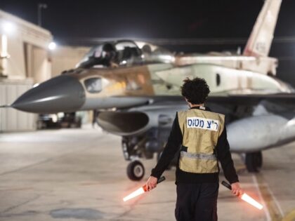 FILE - In this photo provided by the Israeli army, armed Israeli Air Force planes depart f