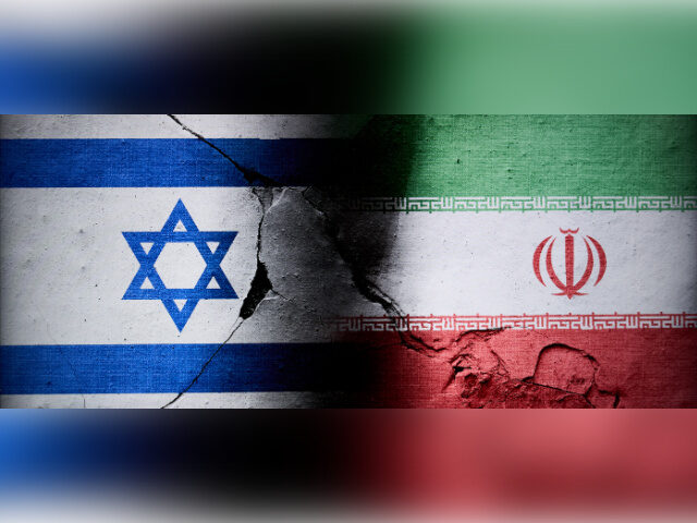 Israeli and Iranian flags are seen in this illustration photo taken in Warsaw, Poland on 1