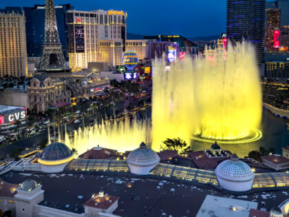 The Bellagio Water Fountain Show is viewed at dusk from Caesars Palace Hotel & Casino