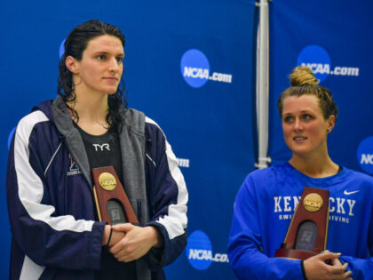 University of Pennsylvania swimmer Lia Thomas and Kentucky swimmer Riley Gaines react afte