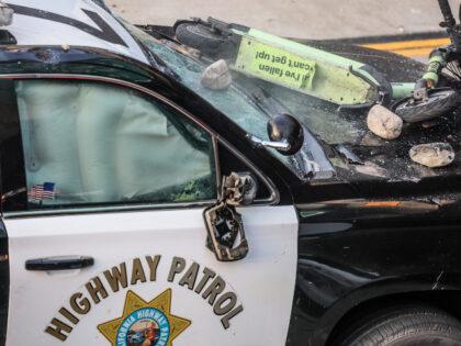 Los Angeles, CA, Sunday, June 8, 2025 - Rocks and a scooter thrown from an overpass lay on