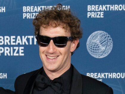 Mark Zuckerberg looking happy in his shades
