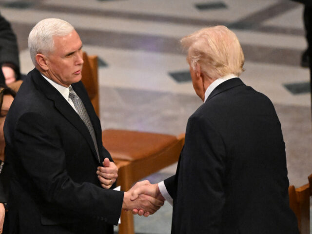 Mike Pence, Donald Trump Former US Vice President Mike Pence (L) shakes hands with President-elect Donald Trump bef