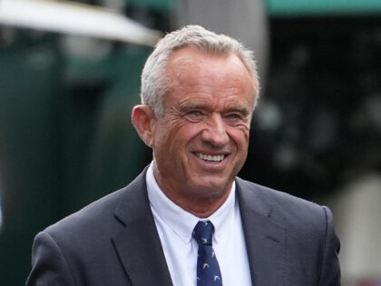 Health and Human Services Secretary Robert F. Kennedy Jr. and his wife Cheryl Hines walk t