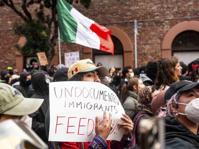 Demonstrators rally against U.S. Immigration & Customs Enforcement raids on Sunday, Ju