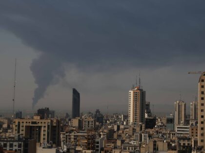 Huge smoke rises up from an oil facility facility after it appeared to have been hit by an