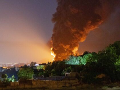 TEHRAN, IRAN - JUNE 15: Fire and smoke rise into the sky after an Israeli attack on the Sh