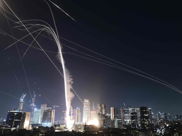 Tel Aviv missile attack (Associated Press) Israeli Iron Dome air defense system fires to intercept missiles over Tel Aviv, Israel, Fr