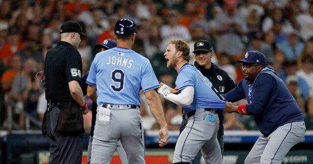 WATCH: Multiple Players Struggle to Restrain Rays' Taylor Walls After Ejection by Umpire