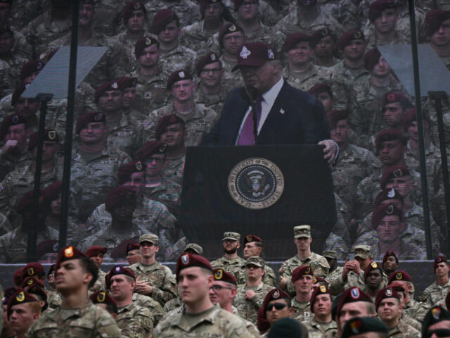 Trump Army Fort Bragg US President Donald Trump is seen on a screen as he speaks at Fort Bragg, a US Army milita