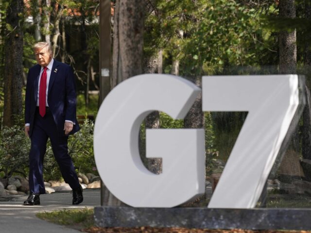 Trump G7 (Mark Schiefelbein / Associated Press) President Donald Trump arrives during the official welcome of the G7 Summit, Monday, June