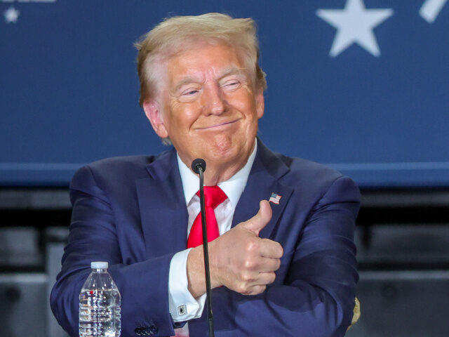 Republican presidential nominee and former U.S. President Donald Trump gives a thumbs up d