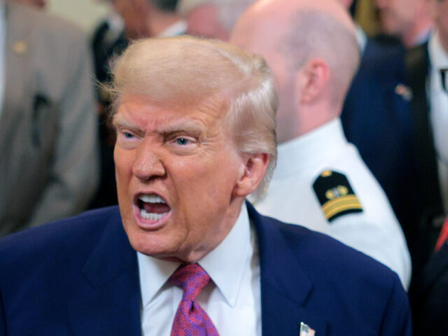 Trump Wants Natasha Bertrand Fired (1) U.S. President Donald Trump responds to a reporters question as he leaves after signing a