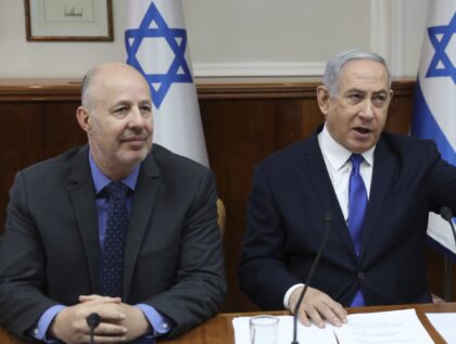 Israeli Prime Minister Benjamin Netanyahu, center, Minister for Regional Cooperation Tzach
