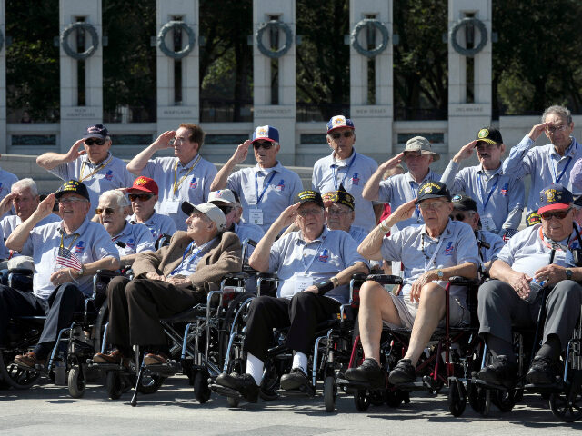 WW II vet World War II veterans from the Chicago-area salute as they visit the World War II Memorial
