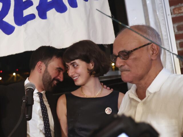 Democratic mayoral candidate Zohran Mamdani, center left, appears on stage with his wife,