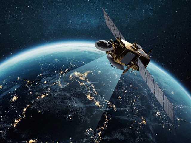 a communications satellite orbits the Earth
