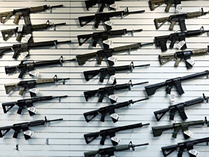 An assortment of semiautomatic rifles are on display for sale at R Guns on April 29, 2023,