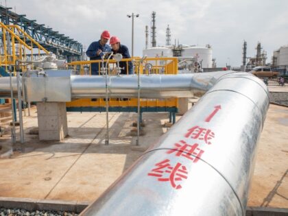 DAQING, CHINA - SEPTEMBER 22: Employees inspect devices as the CNPC's Daqing Petroche