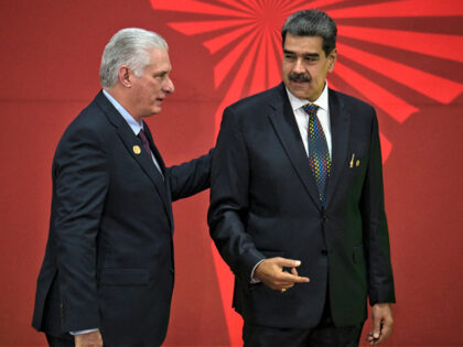 Venezuela's President Nicolas Maduro (R) greets Cuba's President Miguel Diaz-Canel during