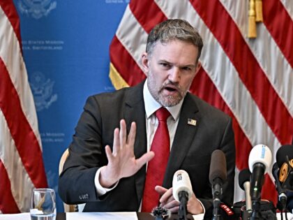US Treasury Secretary Scott Bessent (R) and US Trade Representative Jamieson Greer hold a