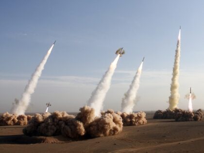 TOPSHOT - Iran's Revolutionary Guards fire test missiles during the first phase of mi