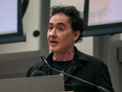 CHICAGO, IL - SEPTEMBER 24: Actor John Cusack speaks at a rally ahead of an upcoming poten