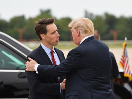 US President Donald Trump is greeted by US senatorial candidate Attorney General Josh Hawl