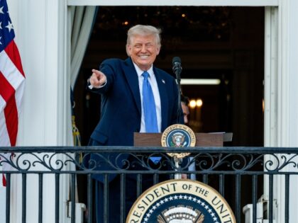 US President Donald Trump on the Truman balcony during a Summer soiree on the South Lawn o