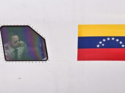 A pilot of Venezuelan airline CONVIASA plane, carrying Venezuelan migrants repatriated fro
