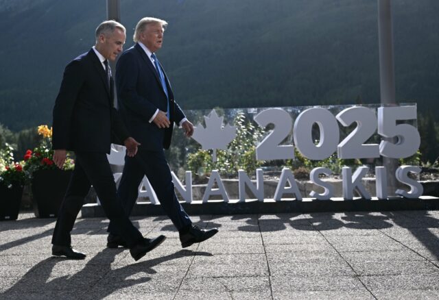 Canadian Prime Minister Mark Carney (L) and US President Donald Trump at a G7 summit in Ca