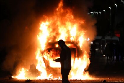 Four houses were damaged by fire, while rioters smashed windows and doors of homes and bus