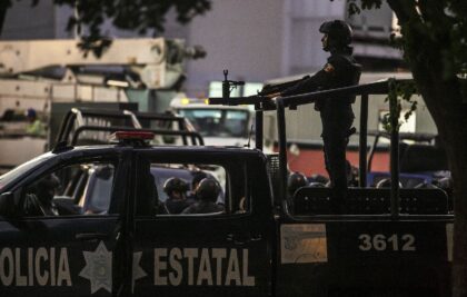 Mexican police on patrol in Sinaloa state, which has been shaken by cartel infighting