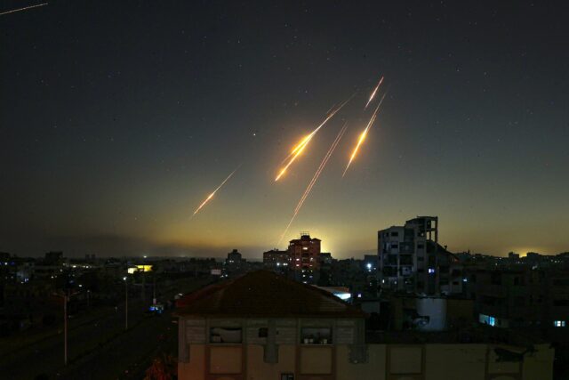 Missiles streak across the sky in this picture taken from Nuseirat in the central Gaza Str