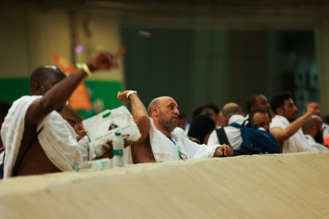 Muslim pilgrims perform the symbolic 'stoning of the devil' ritual as part of the hajj pil