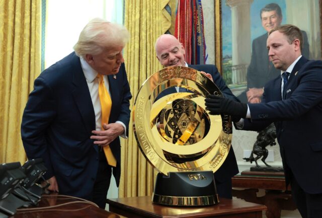 U.S. President Donald Trump and FIFA president Gianni Infantino unveil the Club World Cup