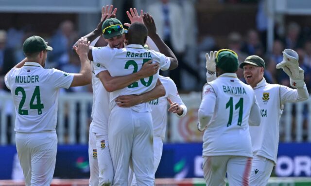 South Africa's Kagiso Rabada (3rd from left) took five Australian wickets on the first day