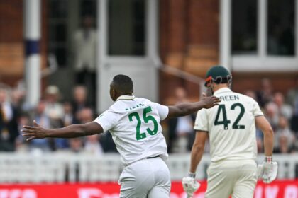 South Africa's Kagiso Rabada celebrates taking the wicket of Australia's Cameron Green on