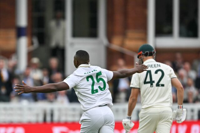 South Africa's Kagiso Rabada celebrates taking the wicket of Australia's Cameron Green on