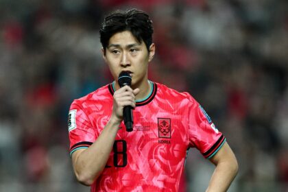 South Korea's Lee Kang-in addresses fans after the team's win against Kuwait