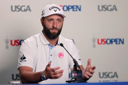 Two-time major winner Jon Rahm of Spain speaks before a practice round ahead of the 125th