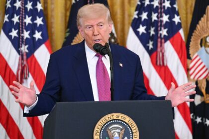 US President Donald Trump speaks before signing a bill in the East Room of the White House