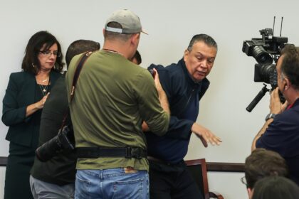 US Senator Alex Padilla, Democrat from California, is removed from the room after interrup