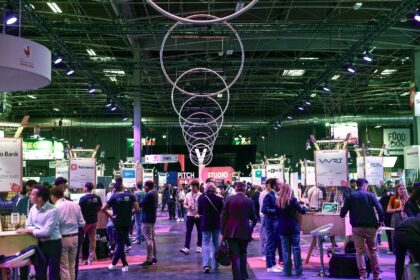 Visitors browse through the stands at the VivaTech technology fair at the Paris Expo Porte