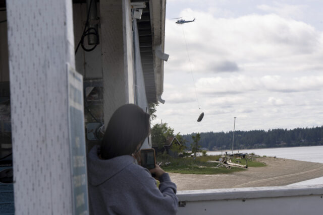 Abandoned Boats Airlifted The Associated Press
