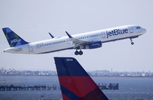 JetBlue flight skids onto grass at Boston Logan International Airport
