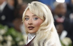 Sabrina Carpenter works hotline in ad for Dunkin' Donuts collab