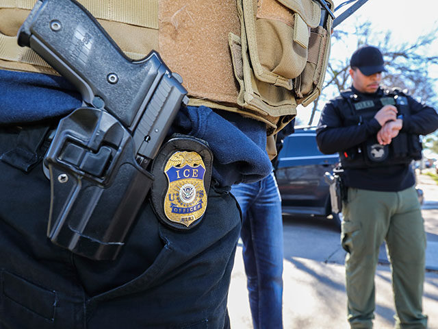 Officers with U.S. Immigration and Customs Enforcement arrest fugitives as part of Operati
